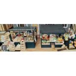 Two miniature modelled street stalls, the first as a pet shop with various livestock and pet food,