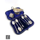A cased set of hallmarked silver teaspoons and tongs, a sauce boat, a napkin ring