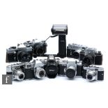 A collection of various 35mm rangefinder cameras, to included Canon AE-1 fitted with Canon 50mm f.