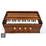 A 20th Century Eastern walnut cased portable organ, pneumatic operation, on stepped plinth, width