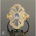 A 9ct hallmarked sapphire and diamond ring central oval sapphire with diamond set fan shaped borders