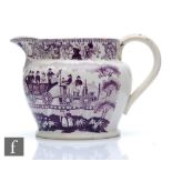 An early 19th Century creamware jug transfer decorated in purple with an early railway scene