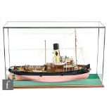 A contemporary scale model of a Tyne tug boat named Joffre, possibly a Calder Craft model, displayed