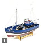 A Lobmaster model lobster fishing boat, complete with crew figures, display stand and box,