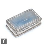 A William IV hallmarked silver rectangular snuff box with engine turned decoration within raised