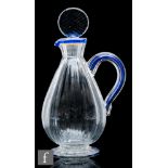 A late 19th Century clear crystal claret jug, possibly continental, the footed and fluted tapered
