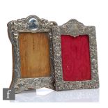 An Art Nouveau hallmarked silver rectangular easel photograph frame decorated with poppies, with a