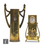 An early 20th Century continental brass Secessionist desk/mantle clock mounted with a Prussian