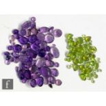 Approximately sixty cut and polished peridot to include faceted pear, oval and round examples,