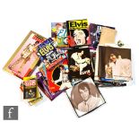 A collection of Elvis Presley related memorabilia, to include thirteen posters, a collection of