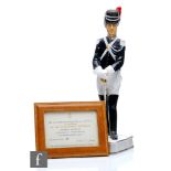 A Royal Worcester military figure from the Papal Series Papal Gendarme modelled by Neal French,