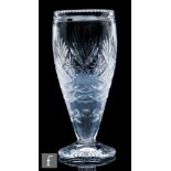A large post war Webb Corbett cut crystal glass vase of footed swollen sleeve form, decorated with
