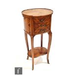 A 20th Century walnut parquetry veneered night stand in the French taste, with two pull-out candle