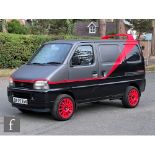 A custom 2005 Suzuki Carry 1.3 van modified inside and out to be a tribute replica of the A-Team
