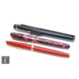 An Onoto No 16 fountain pen in purple marble effect case, a black Onoto pen and Conway clip and a