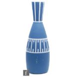 A large post war Flygsfors glass vase of elongated baluster form, the white ground with applied blue