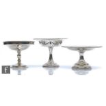 Three hallmarked silver small pedestal comports one pierced, one fluted and one plain, total