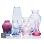 A small collection of later 20th Century Caithness glass vases to include plain, wrythen and cased