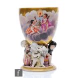 A 19th Century Berlin goblet, the bowl hand painted with a scene of two cherubs on a cloud against a