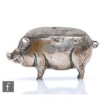 An Edwardian hallmarked pin cushion modelled as a standing pig, weight 45g, length 7cm, Birmingham