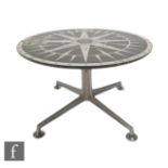 Unknown - A 1960s laminated occasional table of circular form, the top detailed with an image of