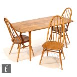 Lucian Ercolani for Ercol Furniture - A model 382 elm and beech dining table of rounded