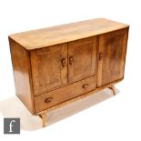 Lucian Ercolani for Ercol Furniture - A model 366 Windsor sideboard of elm and beech construction,