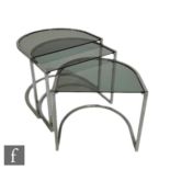 Unknown - A graduated nest of three occasional tables of D-shaped form, with glass tops over