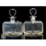 James Powell and Sons - A pair early 20th Century clear crystal decanters, circa 1930s, of square