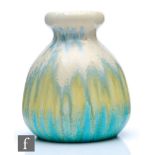 Ruskin Pottery - A crystalline glaze vase of globular form with a knop neck decorated in ivory to