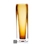 Vicke Lindstrand - Kosta - A post war glass vase of square section, in an amber tint cased in clear,