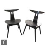 OSM, Denmark - A pair of bent ply cow horn or bull horn chairs, each in a black painted finish,