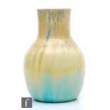 Ruskin Pottery - A crystalline glaze vase decorated in a yellow over a blue green with blue