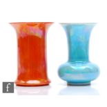 Ruskin Pottery - Two small lustre glaze vases, the first of trumpet form glazed in orange, dated