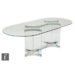 Richard Young - Merrow Associates - A Boulton dining table, the oval glass top above a chromium