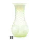 In the manner of James Powell & Sons - An early 20th Century straw opal glass vase with