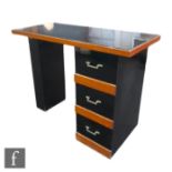 Unknown - A post war desk in the Art Deco style, the rectangular vitrolite glass top within an oak