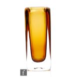 Vicke Lindstrand - Kosta - A post war glass vase of square section, in an amber tint cased in clear,