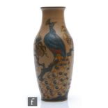 Lauritz Adolph Hjorth - An early 20th Century Danish stoneware vase of slender baluster form,