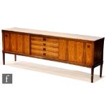 H.W. Klein - Bramin Mobler, Denmark - A rosewood veneered sideboard, fitted with a central bank of