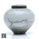 Peter Sparrey - A large contemporary stoneware vase and cover of spherical form with a flat lidded
