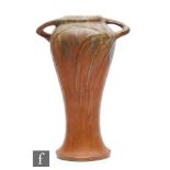 Denbac - An early 20th Century French Art Nouveau twin handled vase, the whiplash handles running