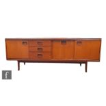 William Lawrence Furniture - A teak sideboard fitted with an arrangement of three drawers, a