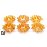 Louis Comfort Tiffany - A set of six glass finger bowls, of circular section with frilled rim all in