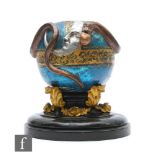 An early 20th Century Freemasons carved wood sphere applied with a moon and a snake holding an