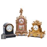 A 19th Century French gilt metal and painted pink porcelain mantle clock decorated with serenading