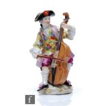 A 19th Century model of the cello player from the Gallant Orchestra, after the original by J.J