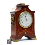 An Edwardian marquetry and mother of pearl inlaid mahogany mantle clock, height 21.5cm.