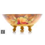 A large Coalport footed fruit bowl decorated to the interior and exterior by Anthony Baggott with