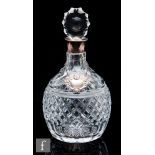 A 20th Century clear crystal decanter, of ovoid form with short flared neck, the body with diamond